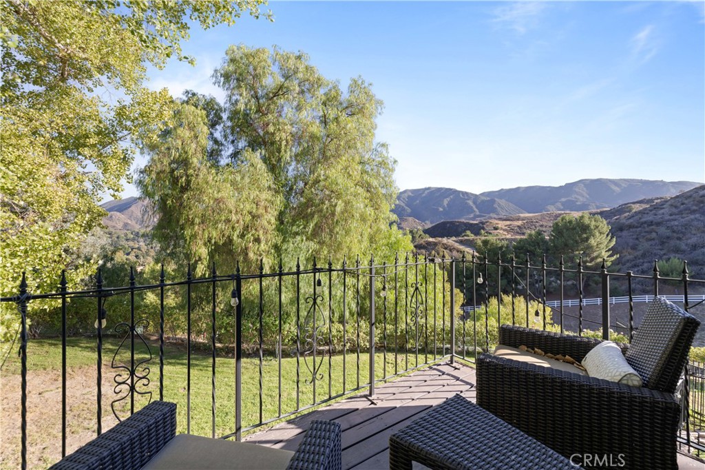16337 Ravenglen Road Canyon Country, CA 91387 - Photo 33 of 50 a view of a couches in the roof deck