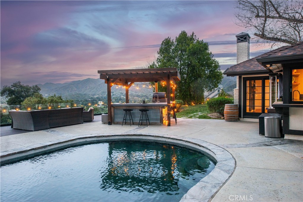 16337 Ravenglen Road Canyon Country, CA 91387 - Photo 40 of 50 swimming pool view with a seating space and fir pit