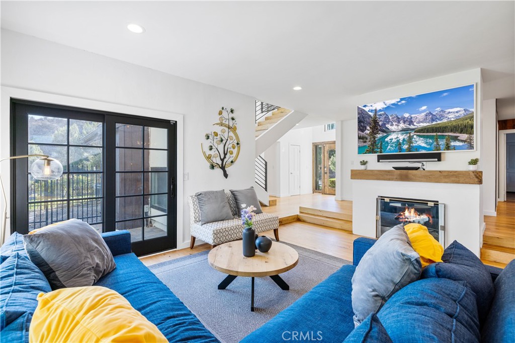 16337 Ravenglen Road Canyon Country, CA 91387 - Photo 4 of 50 a living room with furniture and a flat screen tv
