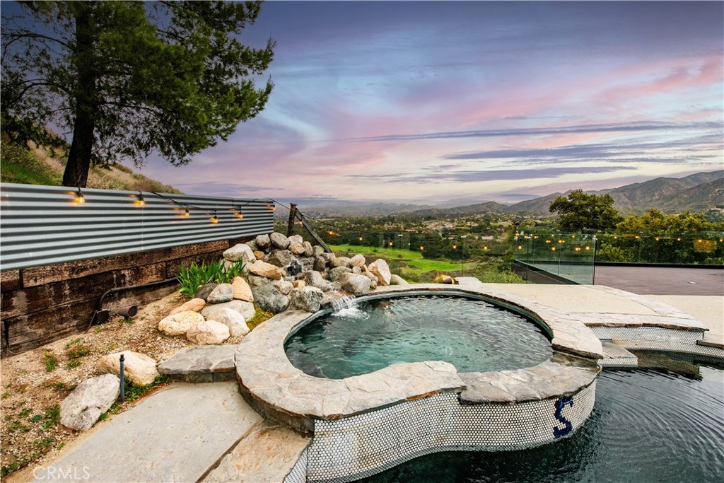 16337 Ravenglen Road Canyon Country, CA 91387 - Photo 42 of 50 a view of swimming pool from a lounge chair