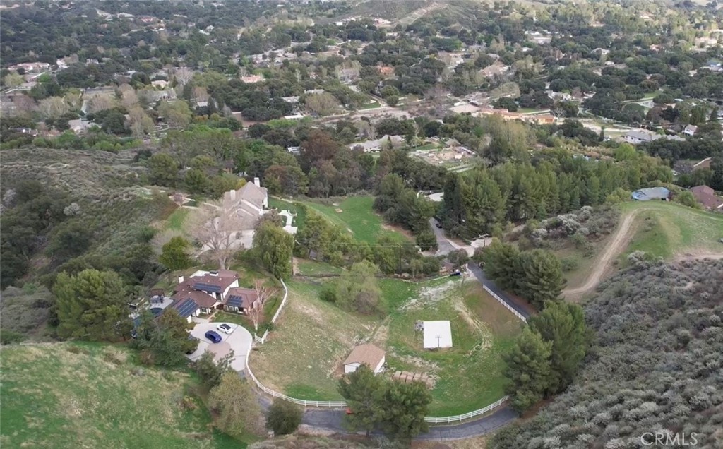 16337 Ravenglen Road Canyon Country, CA 91387 - Photo 49 of 50 an aerial view of residential houses with outdoor space and trees