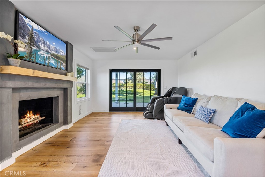 16337 Ravenglen Road Canyon Country, CA 91387 - Photo 7 of 50 a living room with furniture and a fireplace