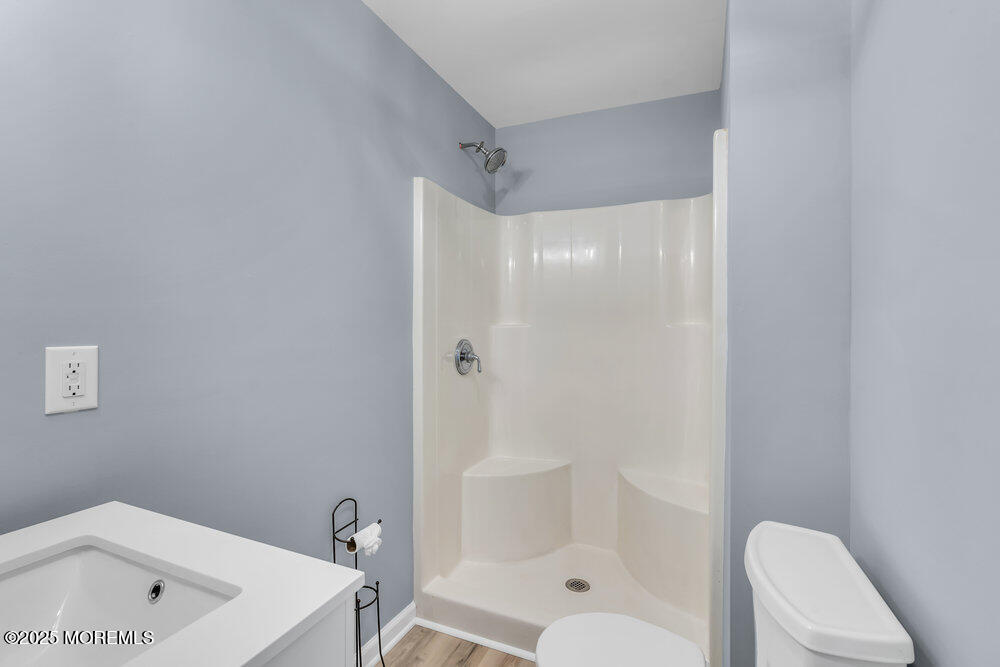 541 Ocean Boulevard Leonardo, NJ 07737 - Photo 12 of 29 a bathroom with a shower and toilet