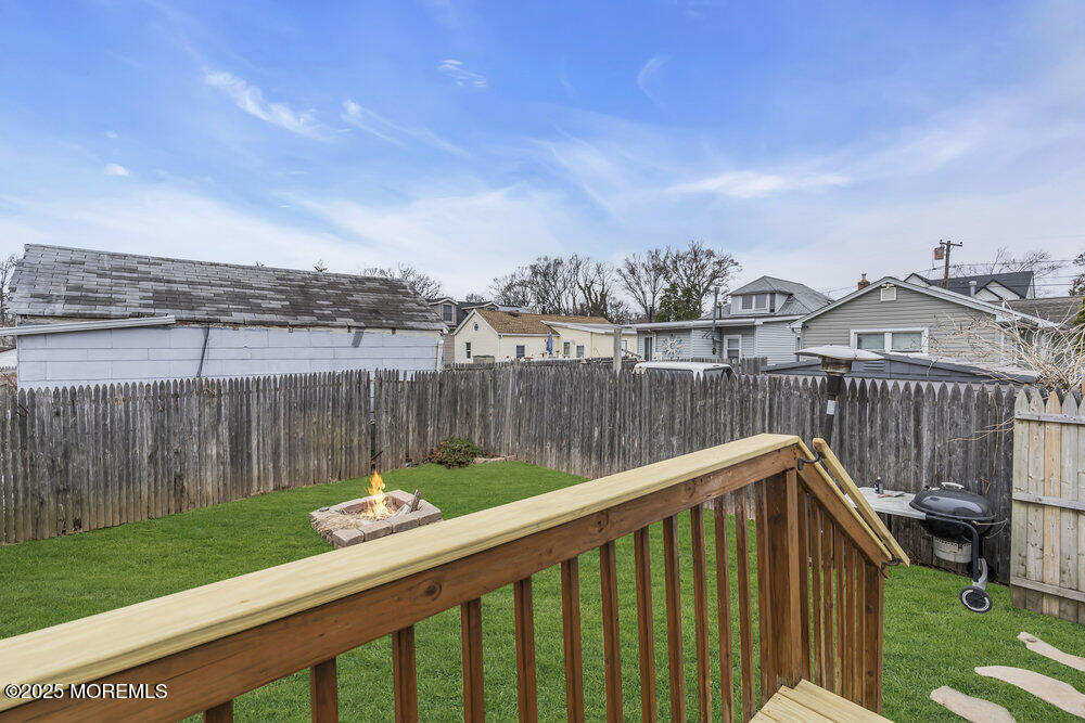 541 Ocean Boulevard Leonardo, NJ 07737 - Photo 14 of 29 a view of a balcony with two chairs and a table