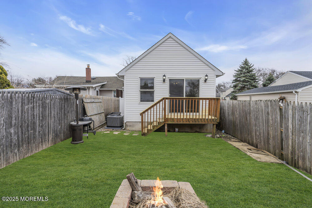 541 Ocean Boulevard Leonardo, NJ 07737 - Photo 17 of 29 a view of a house with a yard and deck