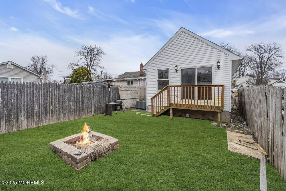 541 Ocean Boulevard Leonardo, NJ 07737 - Photo 18 of 29 a front view of a house with a garden