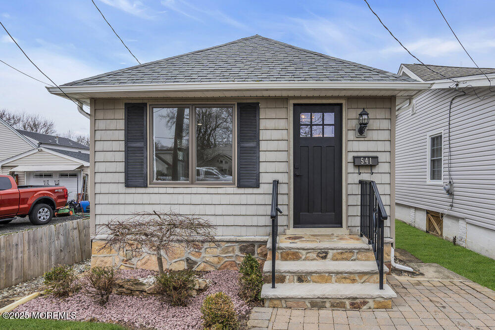 541 Ocean Boulevard Leonardo, NJ 07737 - Photo 2 of 29 a front view of a house with a porch