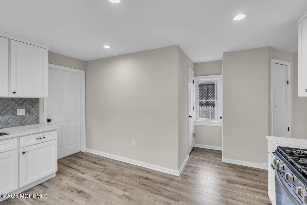 541 Ocean Boulevard Leonardo, NJ 07737 - Photo 25 of 29 a view of a kitchen with wooden floor and electronic appliances