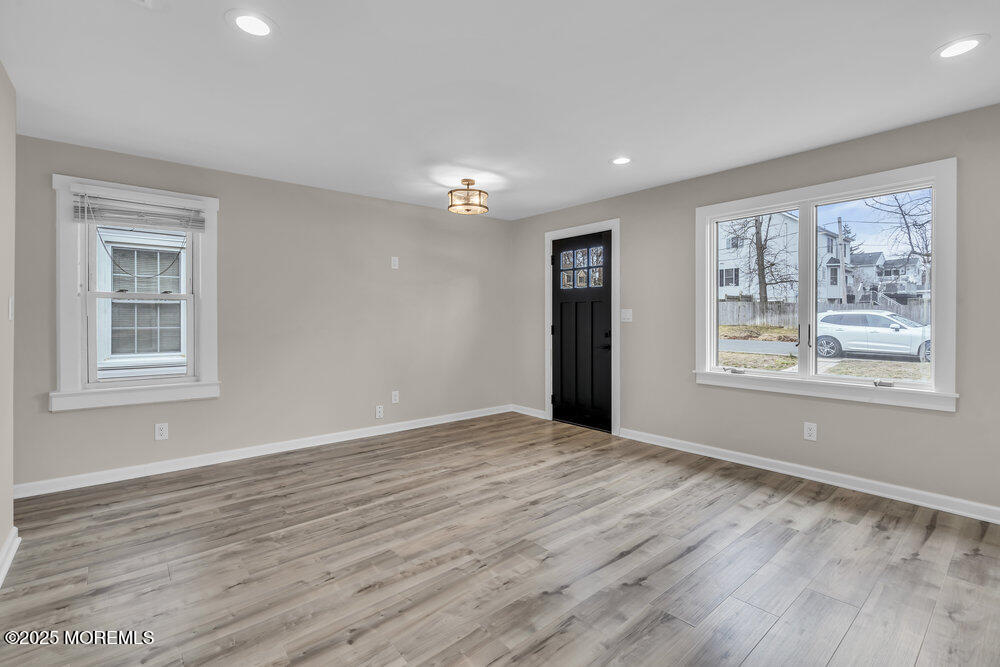 541 Ocean Boulevard Leonardo, NJ 07737 - Photo 6 of 29 a view of an empty room with window and wooden floor