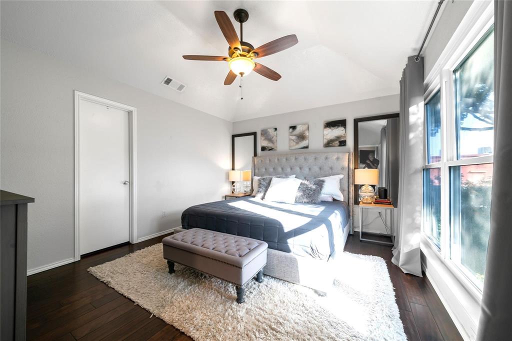 2939 Hunters Point Lane Carrollton, TX 75007 - Photo 24 of 29 a bedroom with a bed and window