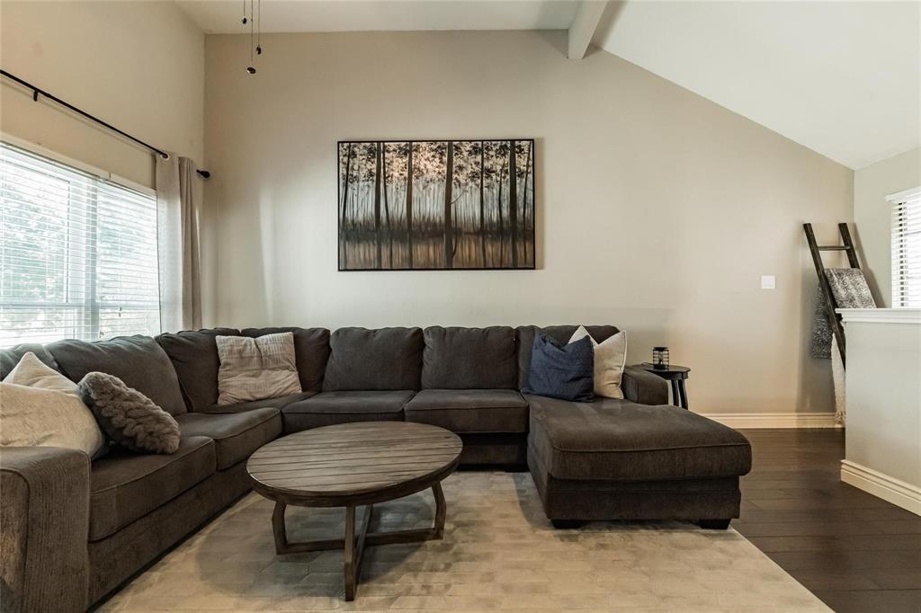 2939 Hunters Point Lane Carrollton, TX 75007 - Photo 5 of 29 a living room with furniture and a large window