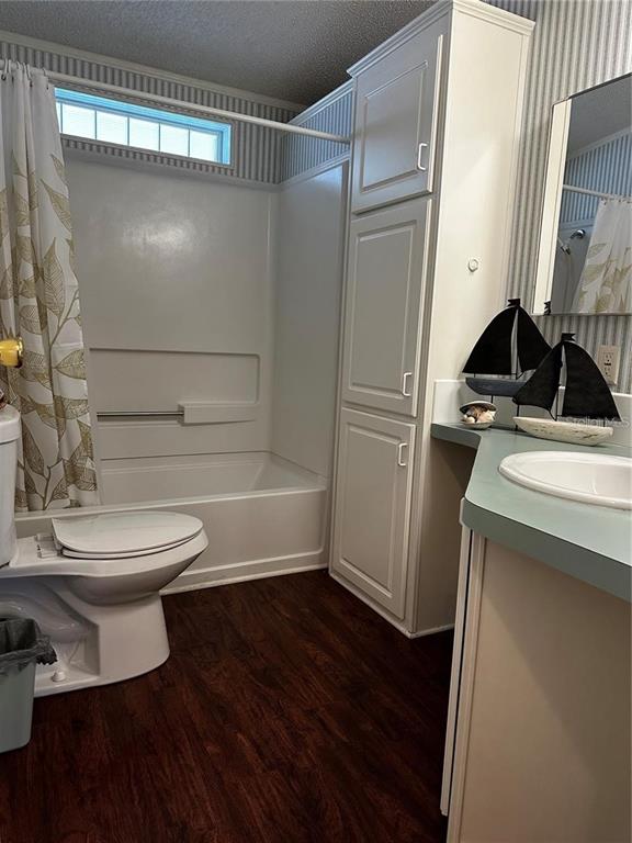 1100 South Belcher Road, Unit 406 Largo, FL 33771 - Photo 19 of 46 a bathroom with a sink a toilet and shower