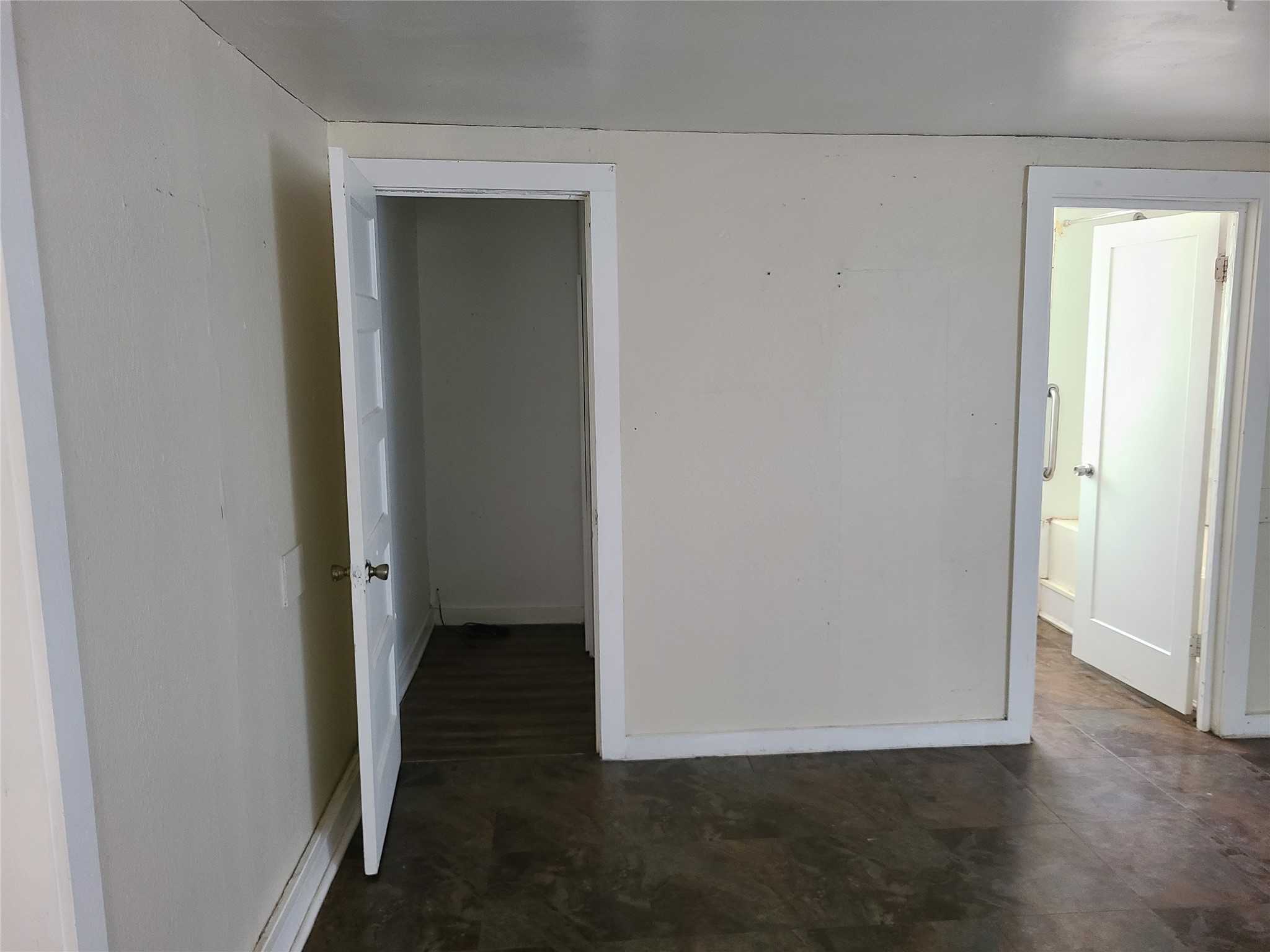 1314 East Power Avenue Victoria, TX 77901 - Photo 7 of 26 a view of a hallway with wooden floor