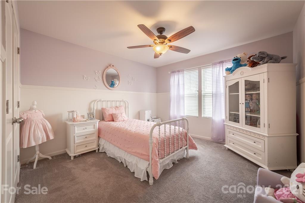 515 Comfort Way Locust, NC 28097 - Photo 17 of 31 a bedroom with a bed and window
