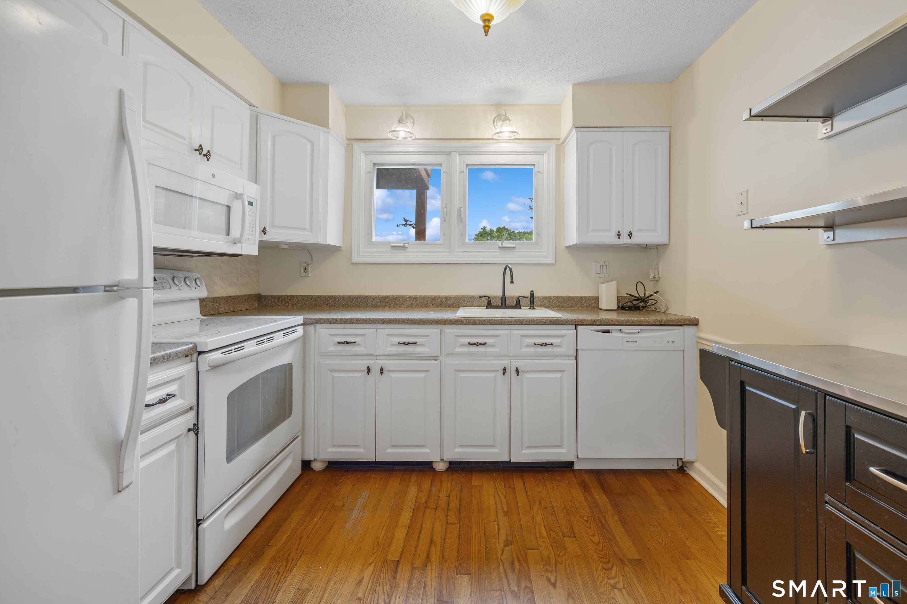 111 Strathmore Lane, Unit 111 Wallingford, CT 06492 - Photo 10 of 32 kitchen as seen from dining room