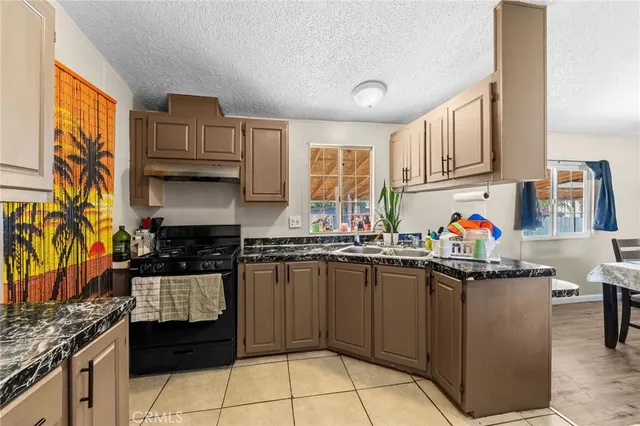 a big house with a big yard and large trees