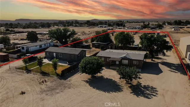 a bedroom with a bed and a mirror