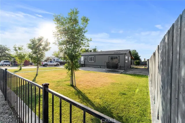 a bedroom with a bed and dresser