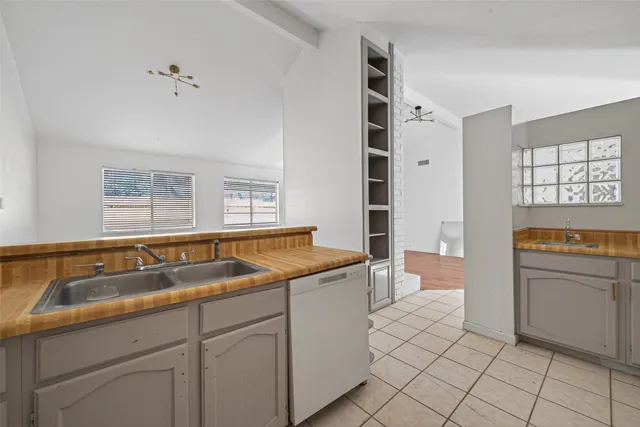 a kitchen with a stove and a microwave