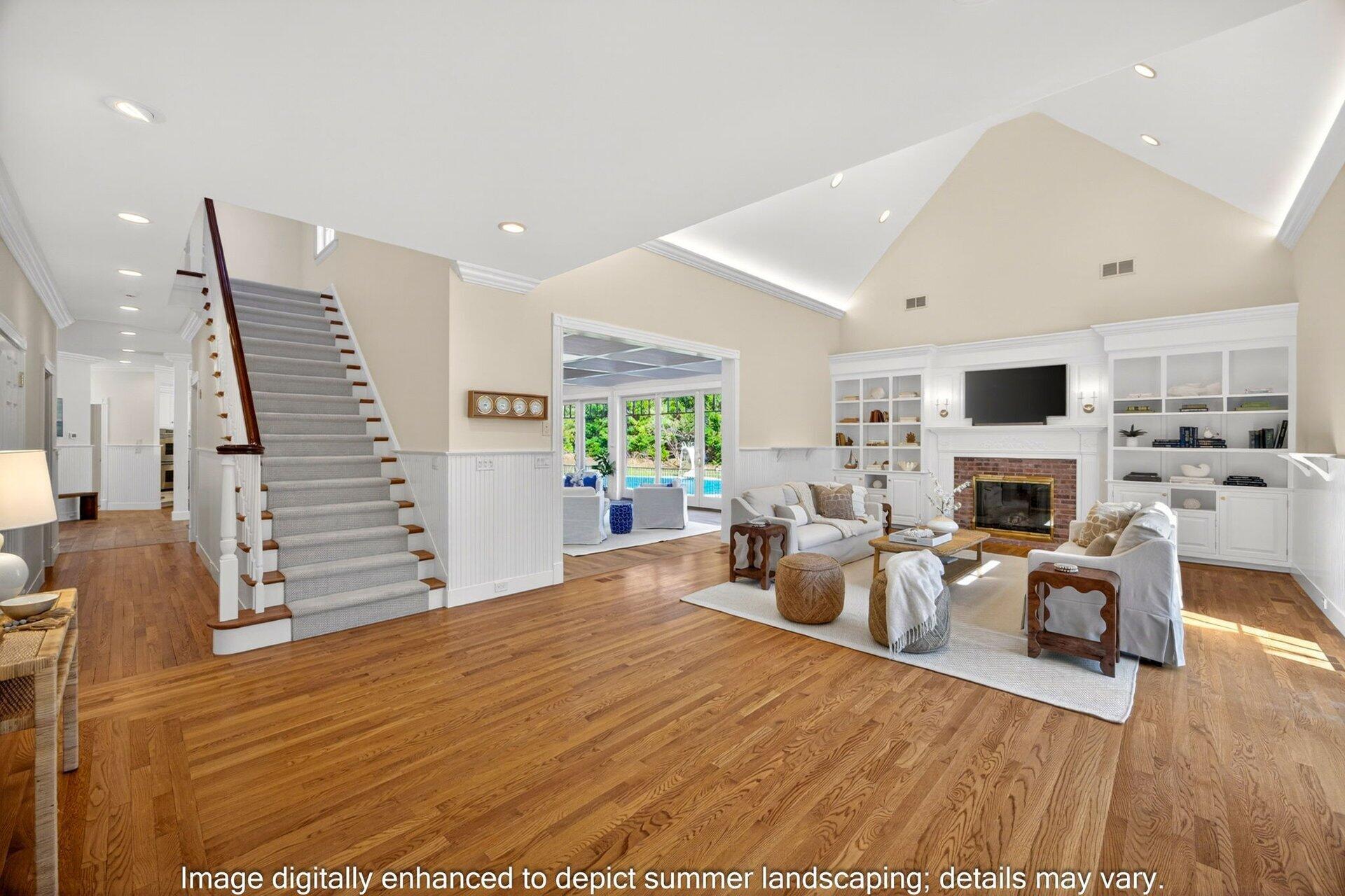 44 Seapuit Road Osterville, MA 02655 - Photo 3 of 33 a bed room with furniture and a fireplace