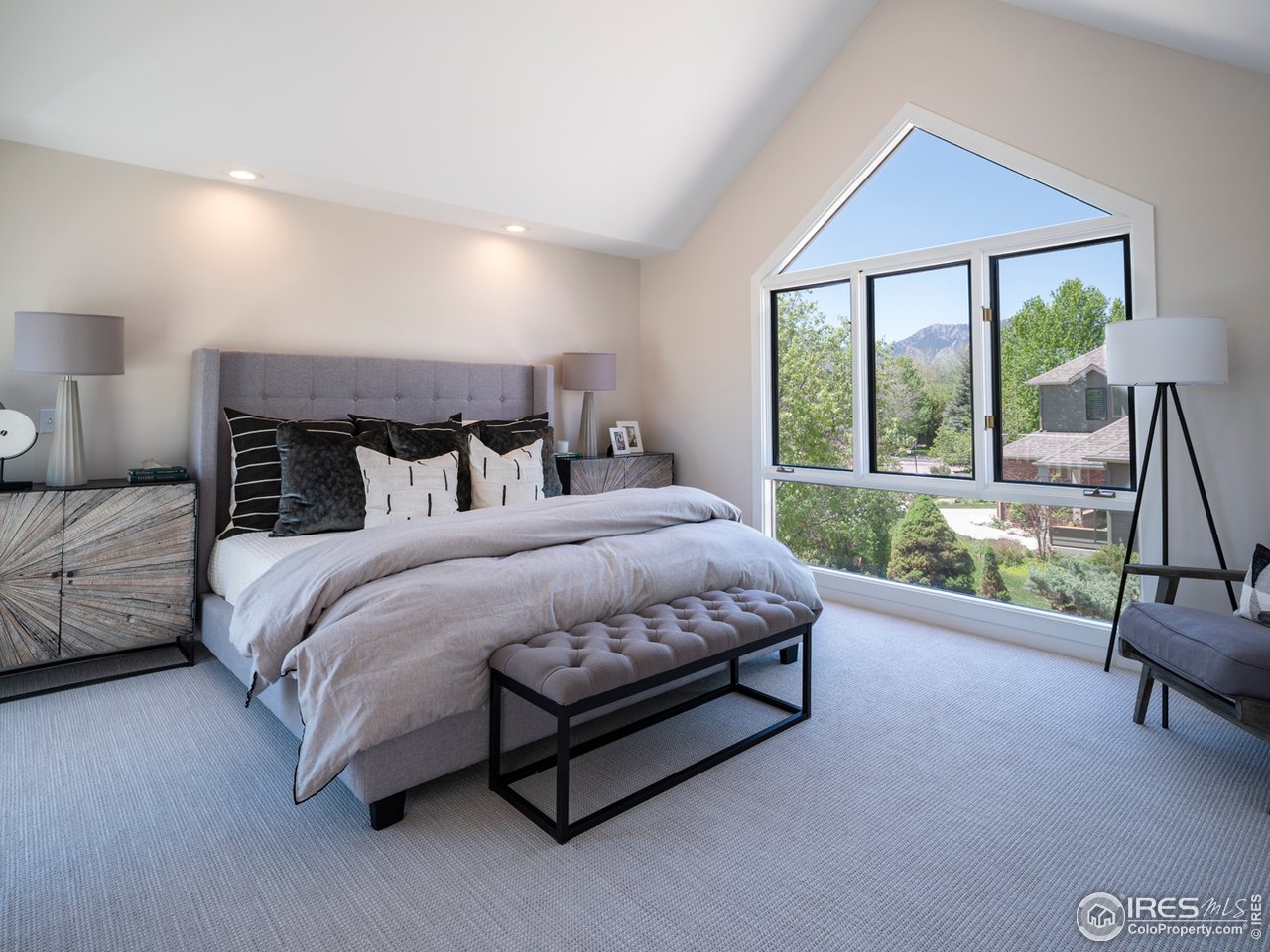 5685 Euclid Place Boulder, CO 80303 - Photo 18 of 38 a bedroom with a bed and a view of balcony