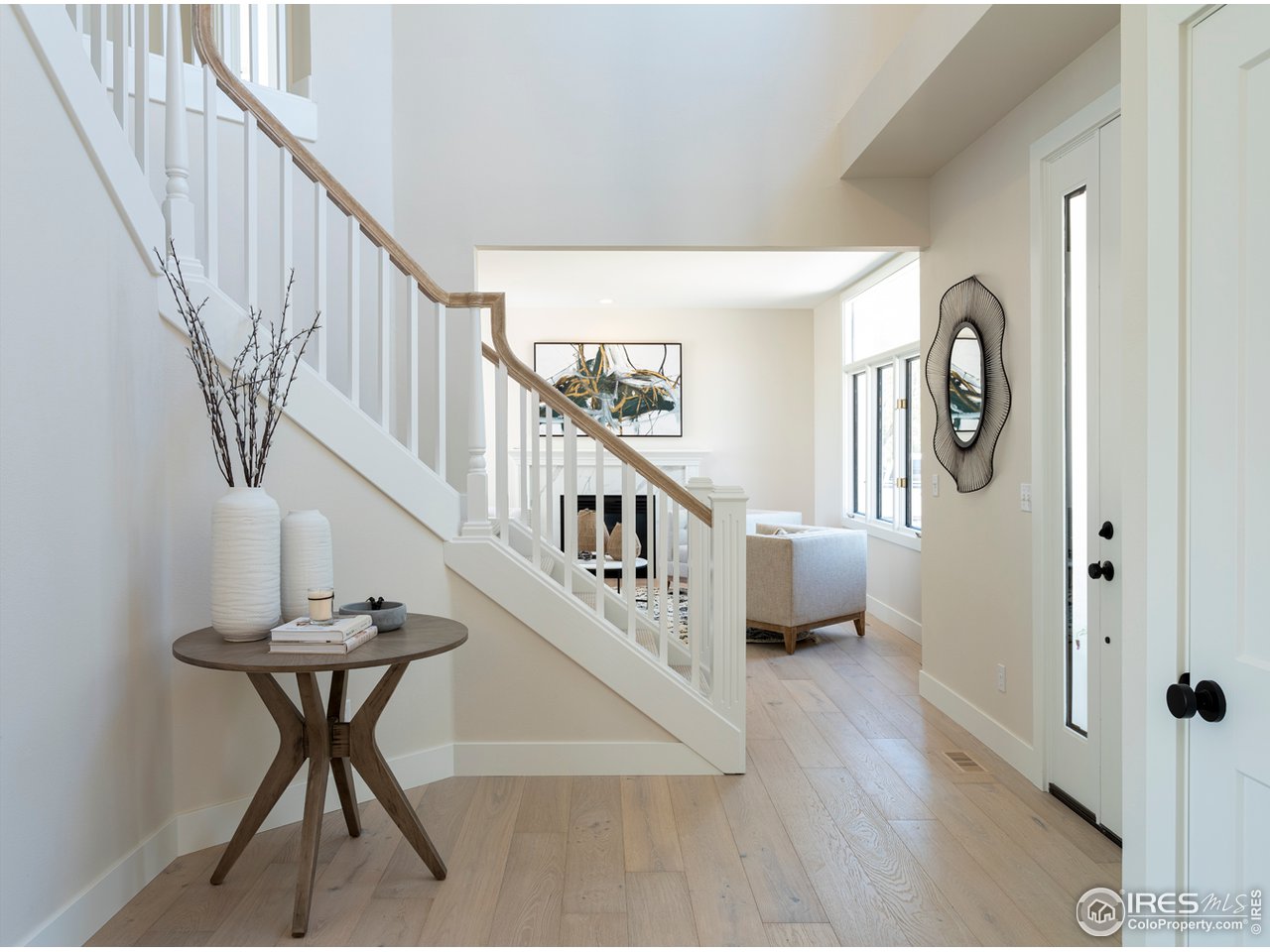 5685 Euclid Place Boulder, CO 80303 - Photo 8 of 38 a view of entryway livingroom and hall with wooden floor