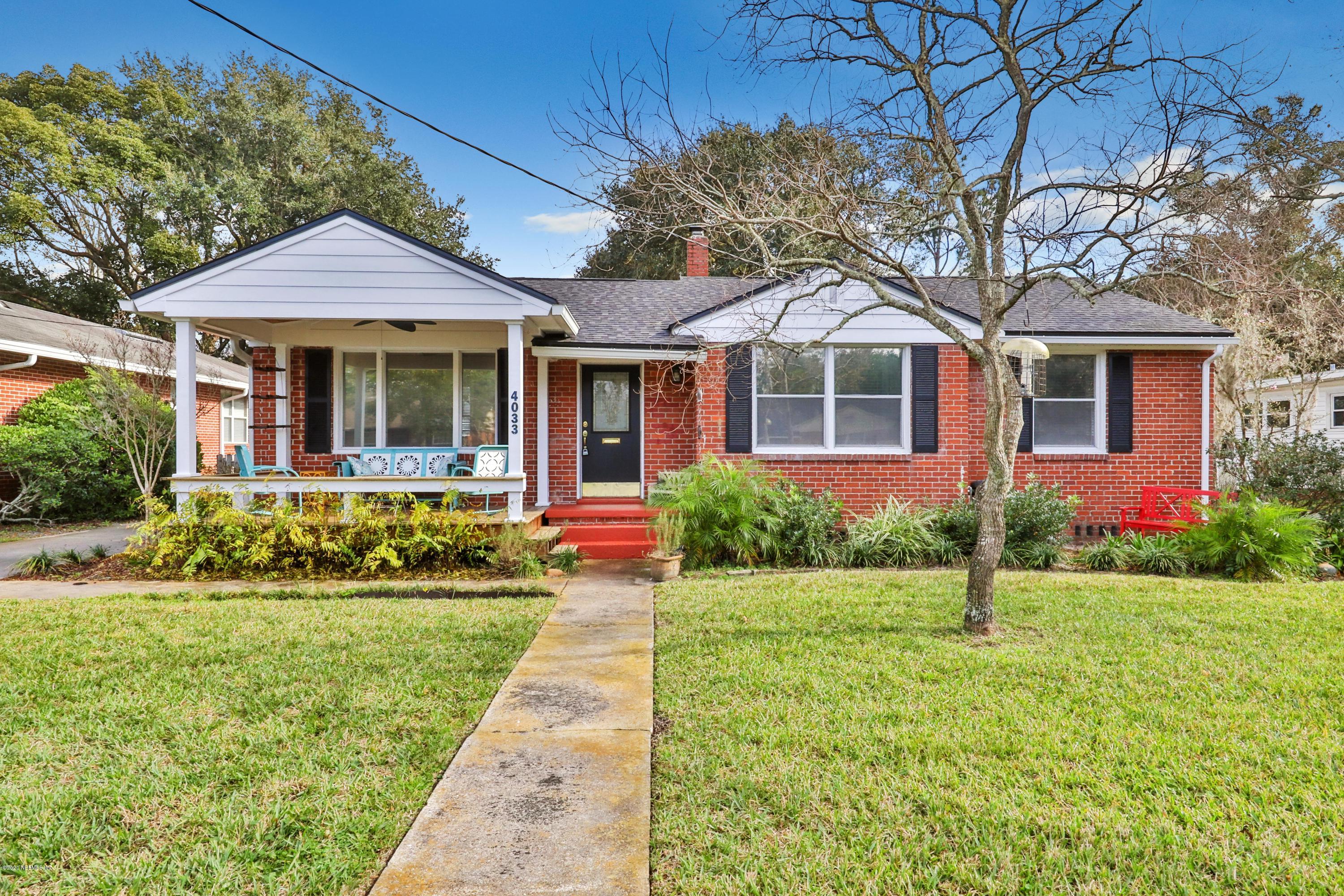 4033 Dover Road Jacksonville, FL 32207 - Photo 1 of 25 a front view of a house with a yard