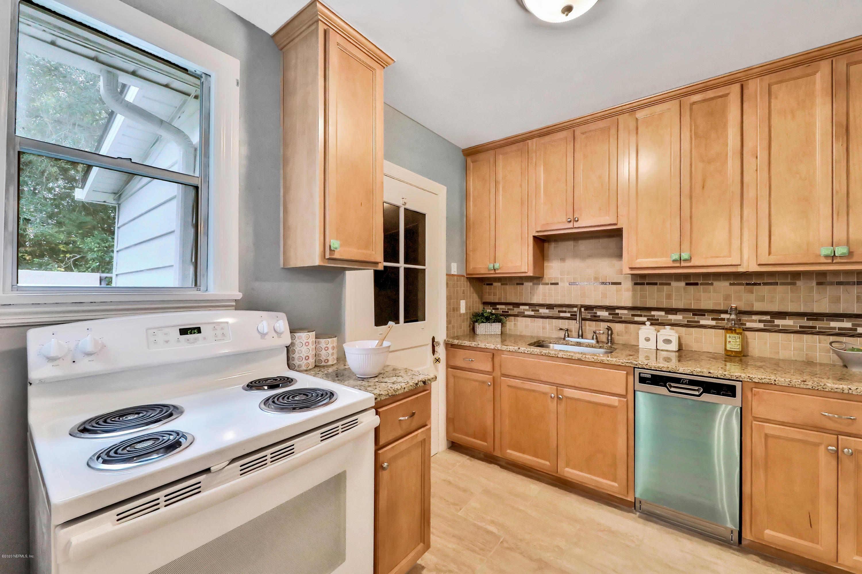 4033 Dover Road Jacksonville, FL 32207 - Photo 13 of 25 a kitchen with appliances cabinets and a sink