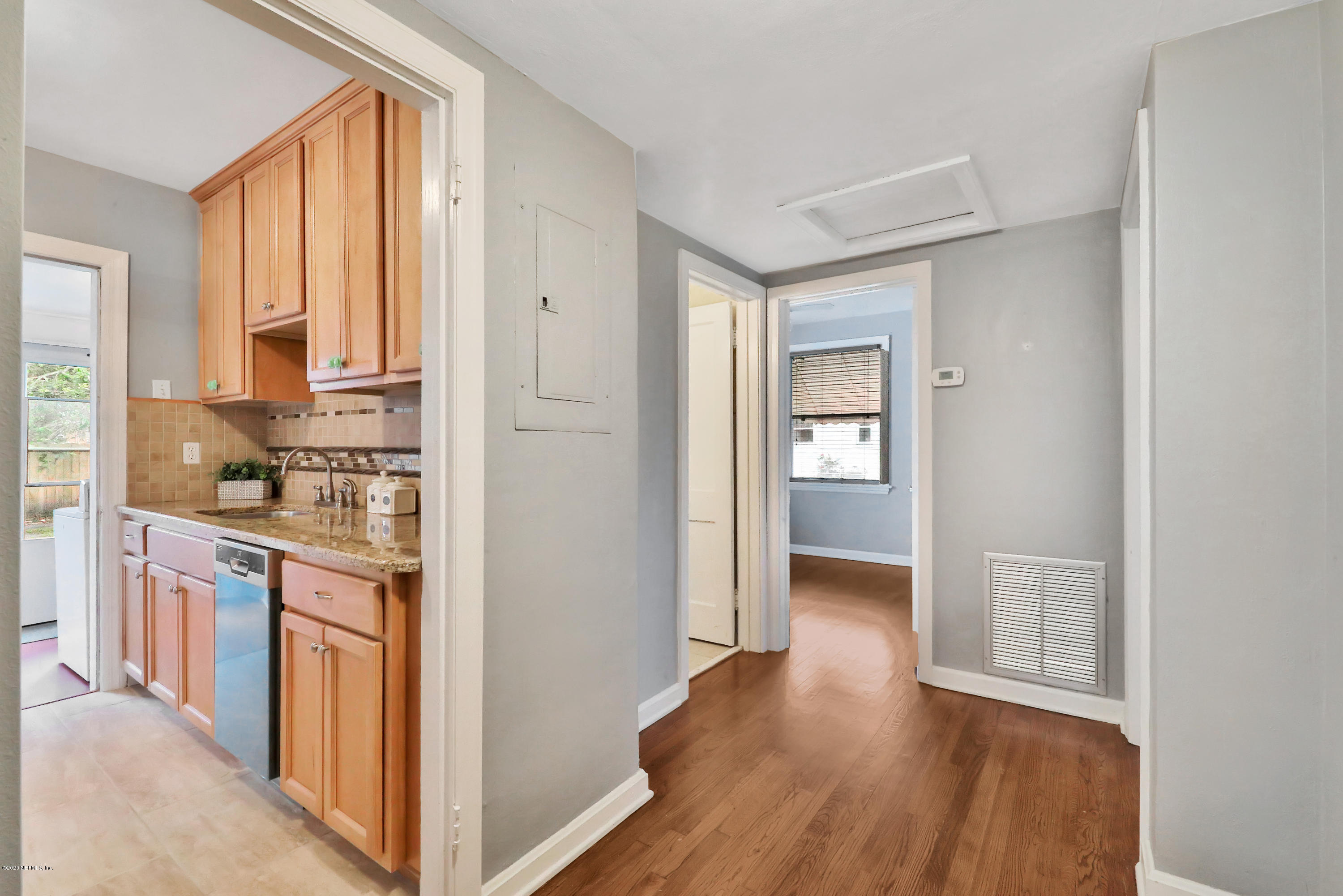 4033 Dover Road Jacksonville, FL 32207 - Photo 14 of 25 a kitchen with stainless steel appliances granite countertop a stove and a refrigerator