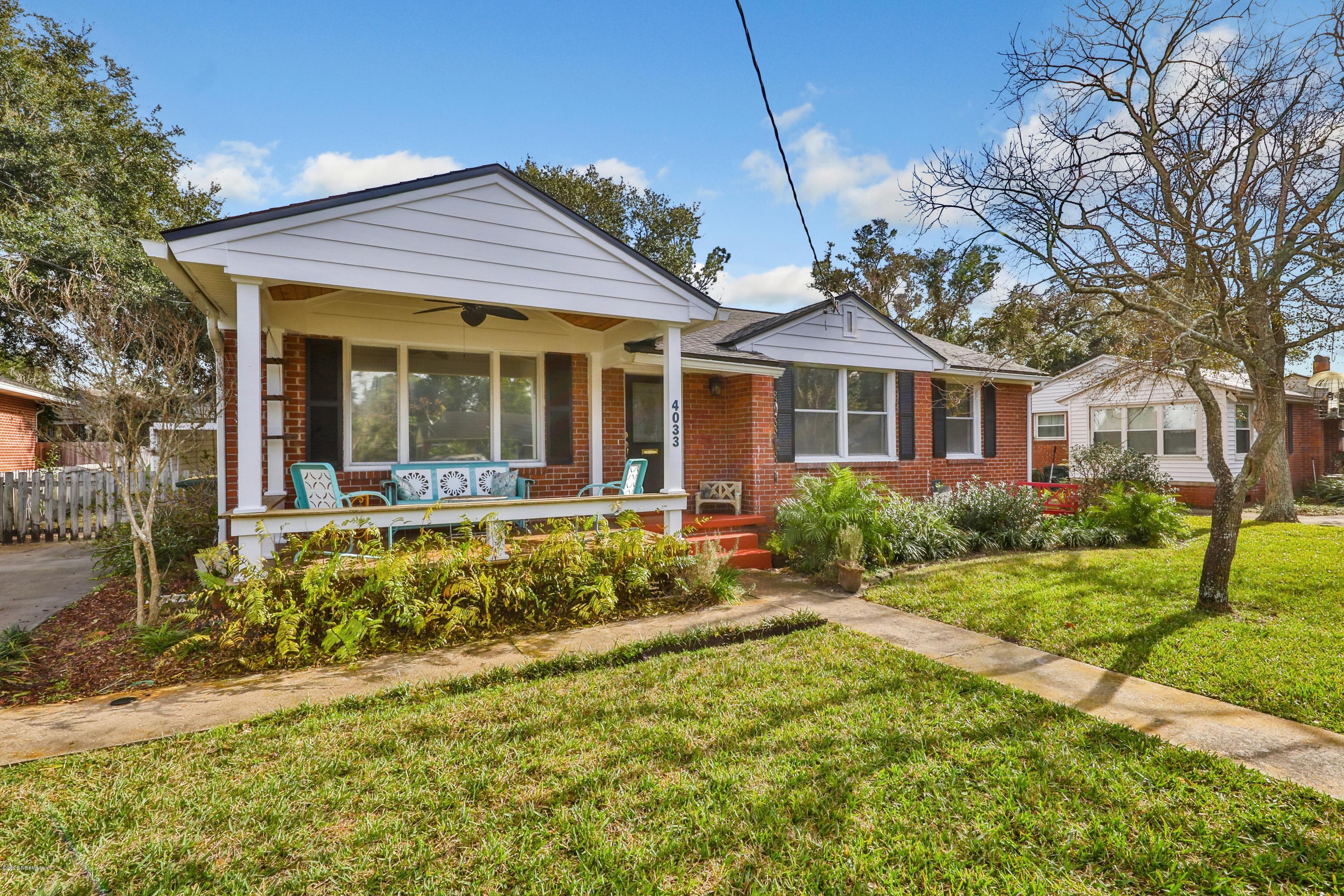 4033 Dover Road Jacksonville, FL 32207 - Photo 2 of 25 a front view of a house with a yard