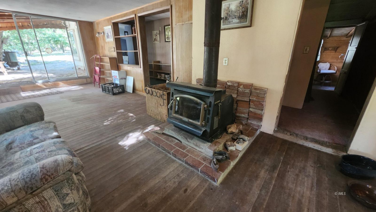 1915 Sage Flats Drive Olancha, CA 93549 - Photo 11 of 34 a living room with furniture windows and a flat screen tv