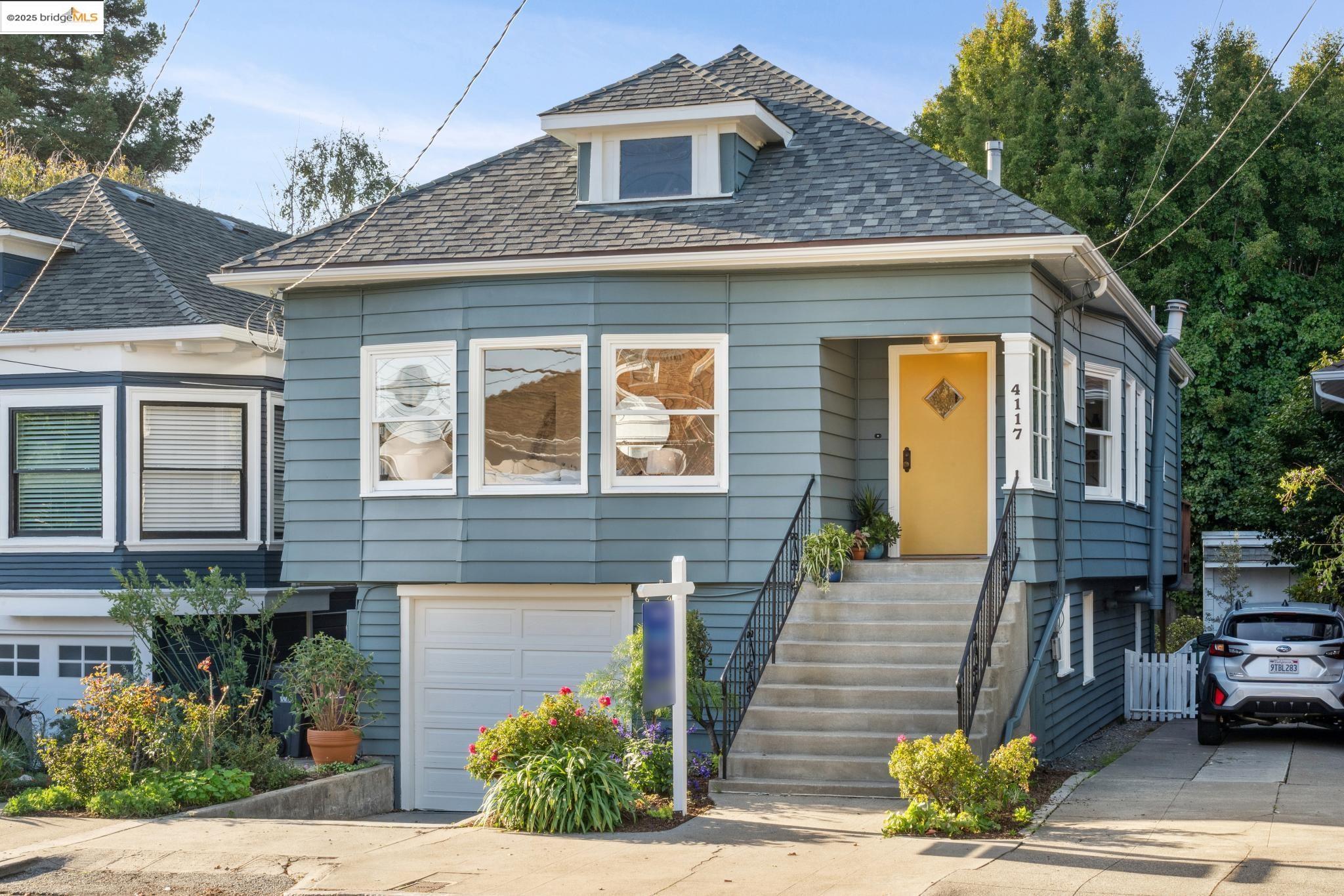 a front view of a house with glass windows