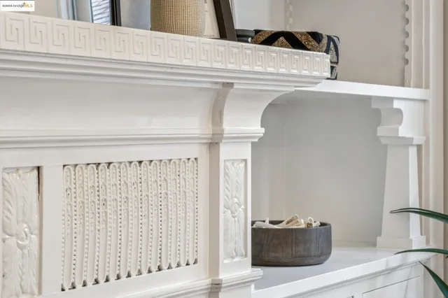 a kitchen with stainless steel appliances a stove a sink and a refrigerator