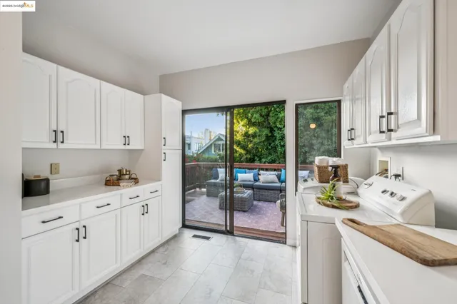 a bedroom with a bed and a chair in it