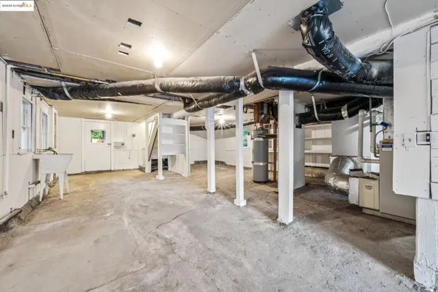 a balcony with wooden floor and outdoor seating