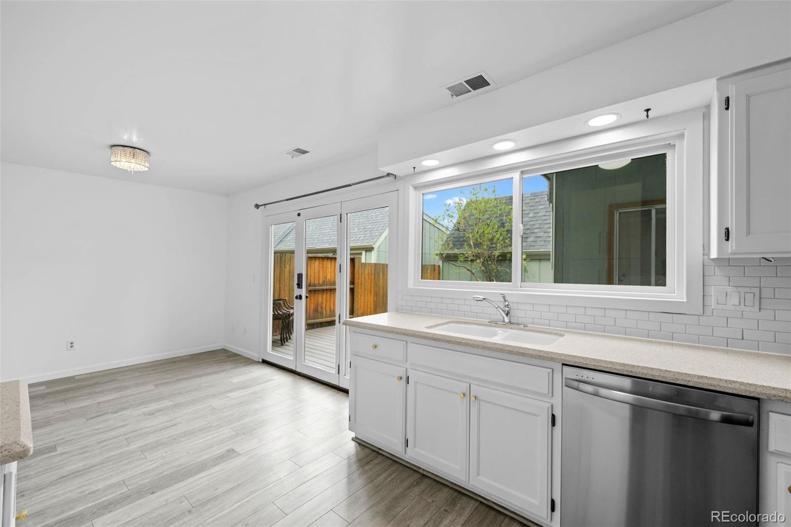 34 Benthaven Place Boulder, CO 80305 - Photo 17 of 40 a kitchen with a sink cabinets and window