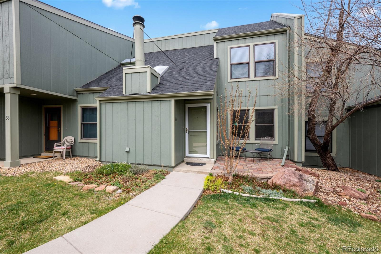 34 Benthaven Place Boulder, CO 80305 - Photo 2 of 40 a view of a house with backyard porch and furniture