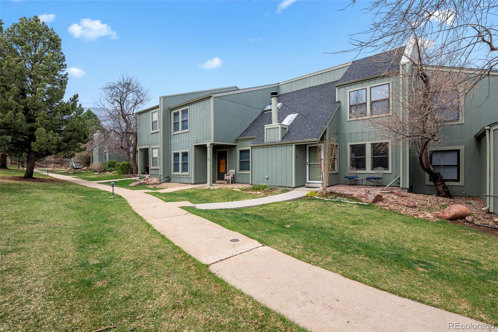 34 Benthaven Place Boulder, CO 80305 - Photo 39 of 40 a front view of a house with a yard