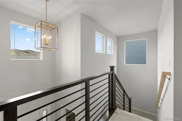 a view of a hallway with windows