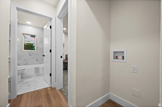189 West Center Street Midvale, UT 84047 - Photo 22 of 64 Hallway featuring wood-finish flooring