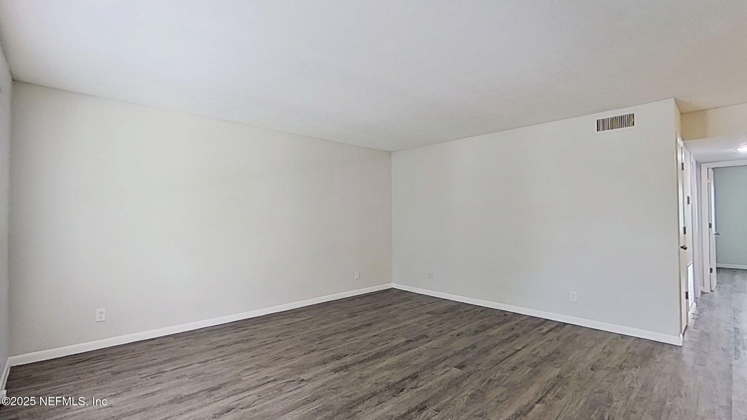 2216 Spring Park Road, Unit 6 Jacksonville, FL 32207 - Photo 18 of 32 a view of an empty room with wooden floor