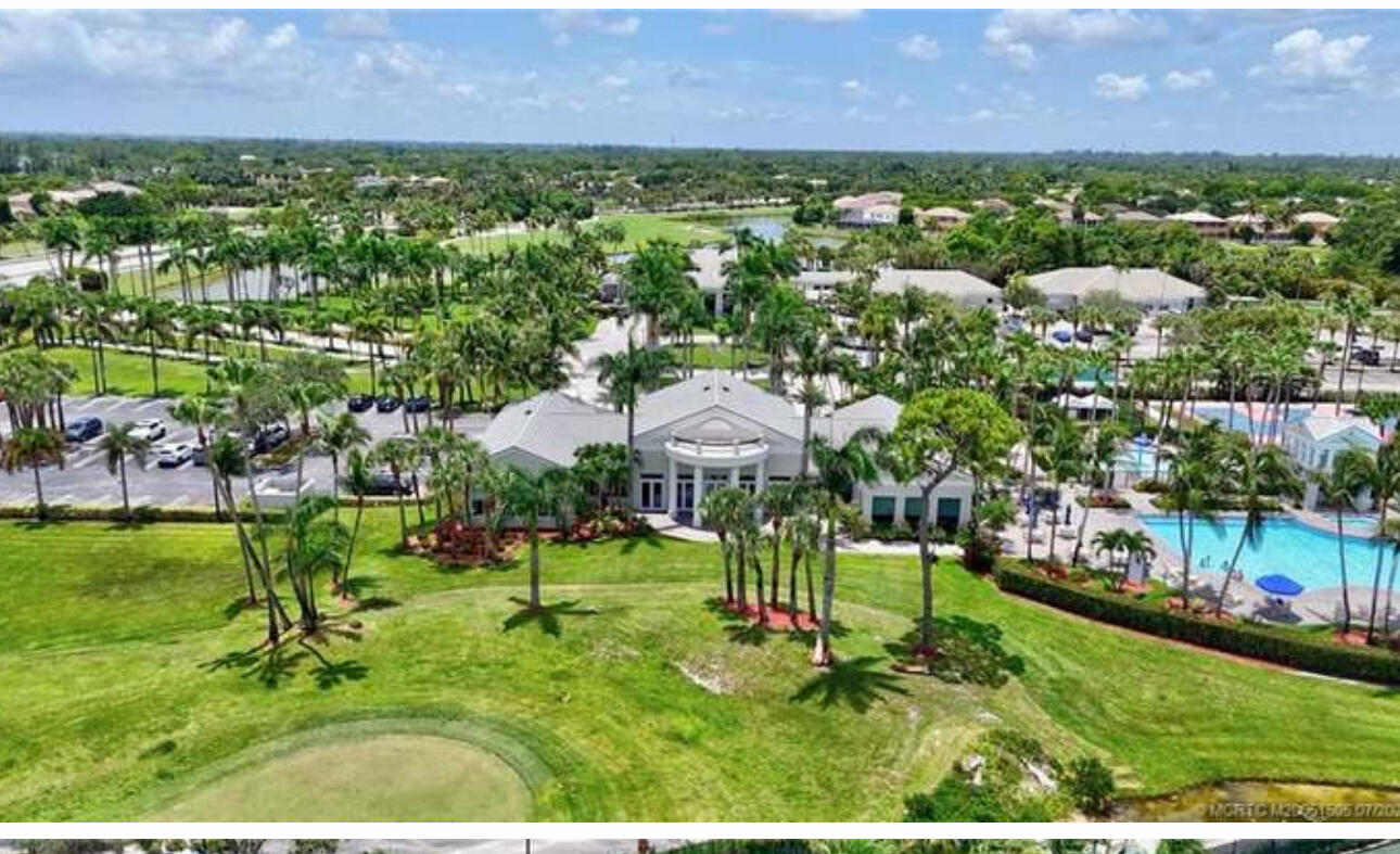 2261 Ridgewood Circle Royal Palm Beach, FL 33411 - Photo 11 of 12 a view of a house with a garden