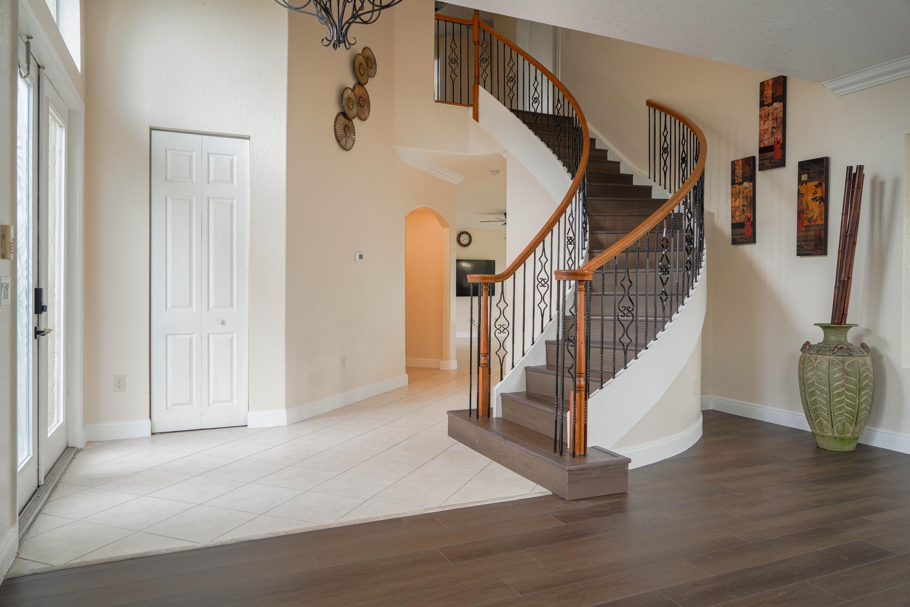 2261 Ridgewood Circle Royal Palm Beach, FL 33411 - Photo 5 of 12 a view of entryway with wooden floor