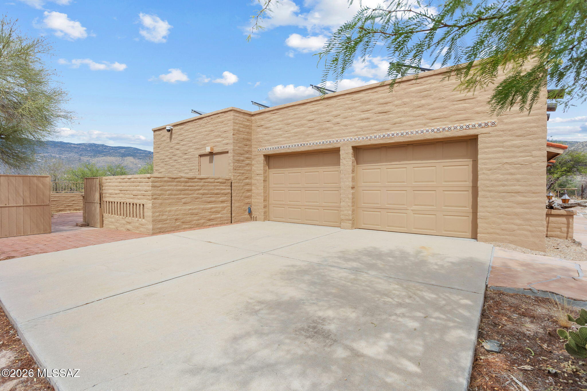 7171 South X9 Ranch Road Vail, AZ 85641 - Photo 47 of 50 Rhino Shield exterior paint on home and backyard wall.