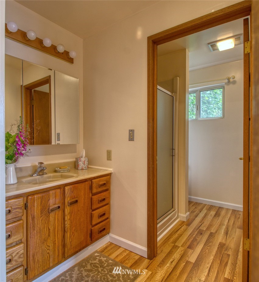 3370 East Quilcene Road Quilcene, WA 98376 - Photo 18 of 34 a bathroom with a sink and a mirror