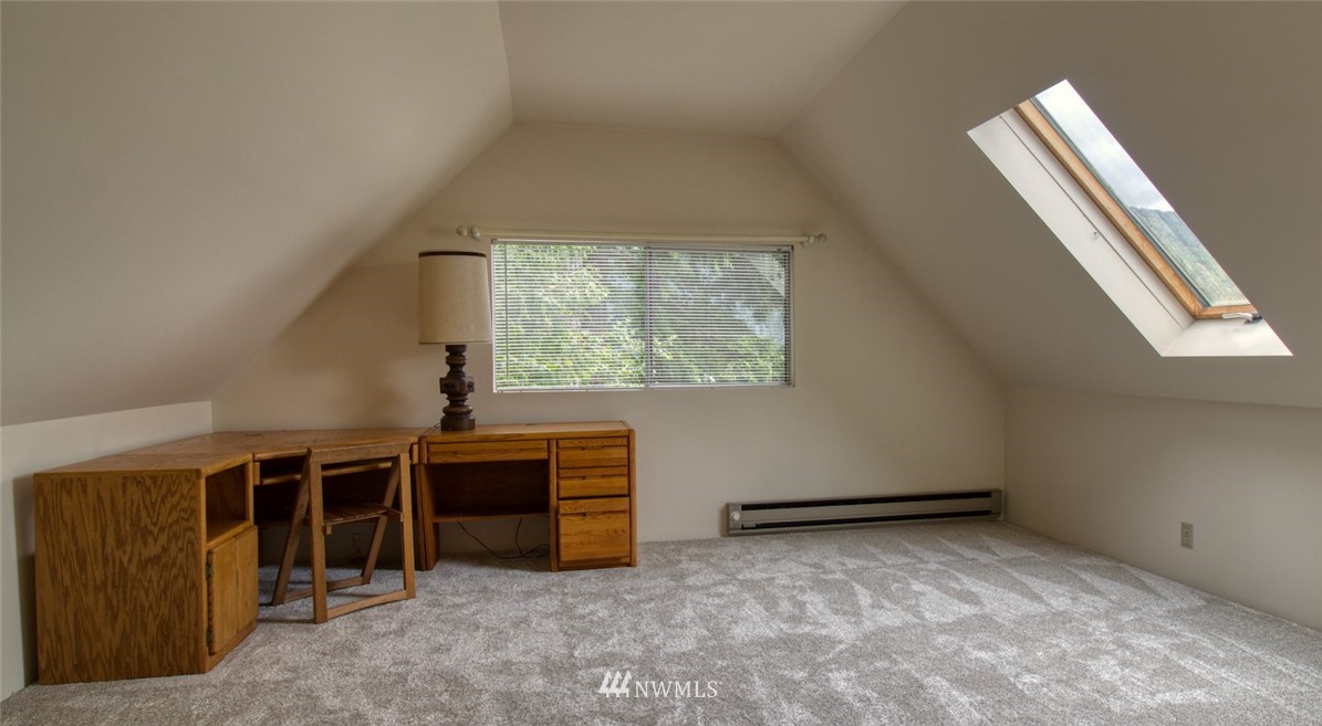 3370 East Quilcene Road Quilcene, WA 98376 - Photo 27 of 34 an empty room with windows