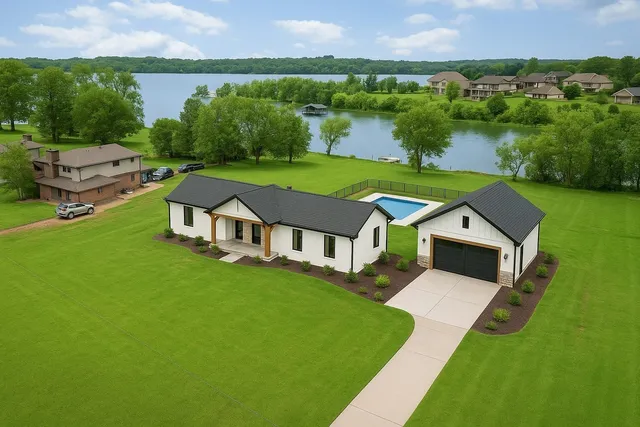 an aerial view of a house with a garden
