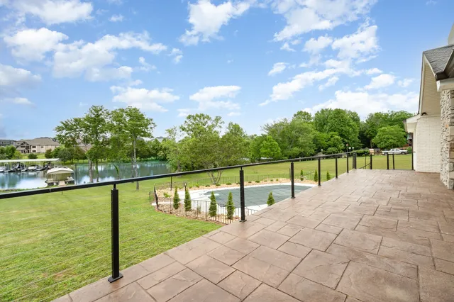 a view of ocean with a big yard