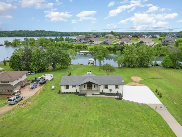 an aerial view of a house with a garden