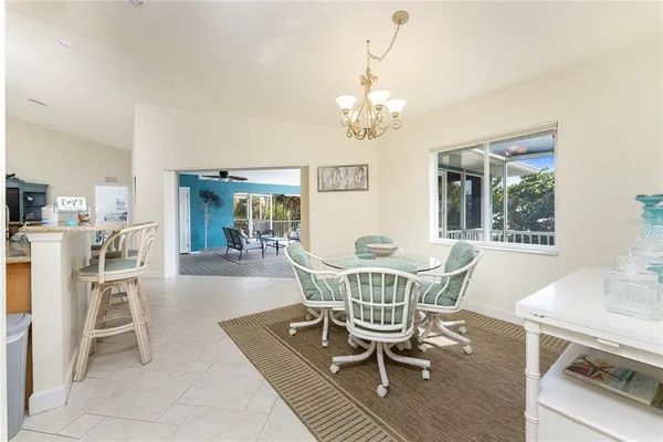 a bathroom with a sink a mirror and a shower